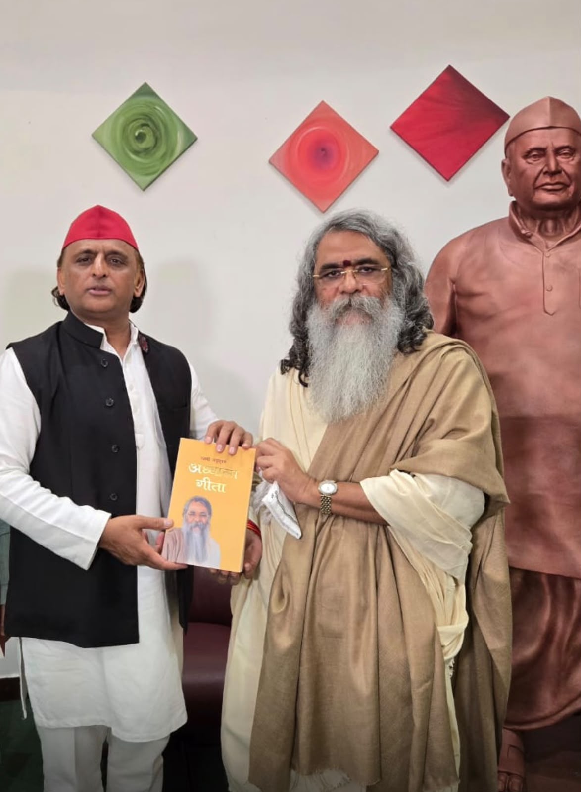 Presenting Adhyatma Gita to Shri Akhilesh Yadav Ji, former Chief Minister of Uttar Pradesh