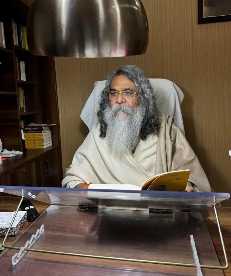 Maharishi Yogi Madhusudan Ji reading a spiritual text