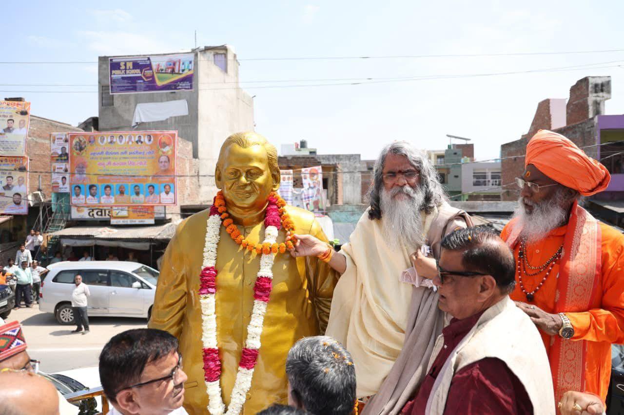 Maharishi Yogi Madhusudan Ji at a public event 3